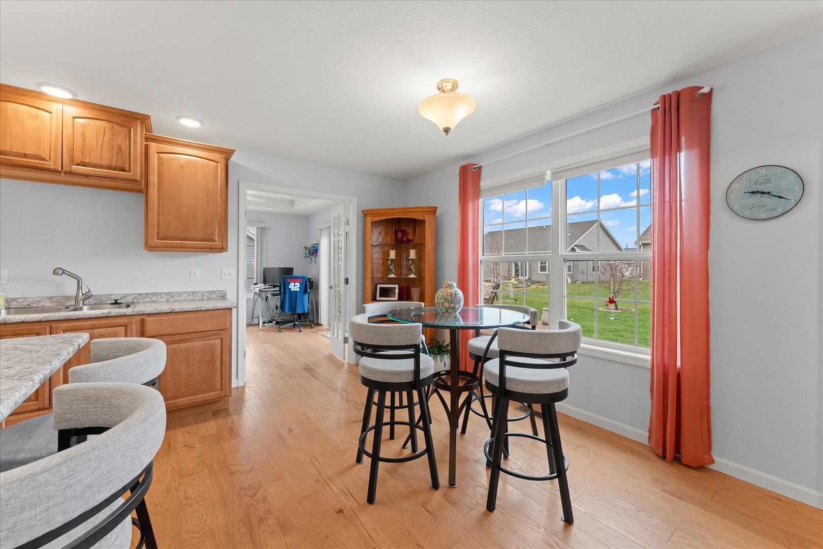 3503 South Deer Ridge Drive Urbana, IL 61802 - Photo 11 of 51 a dining room with furniture and wooden floor