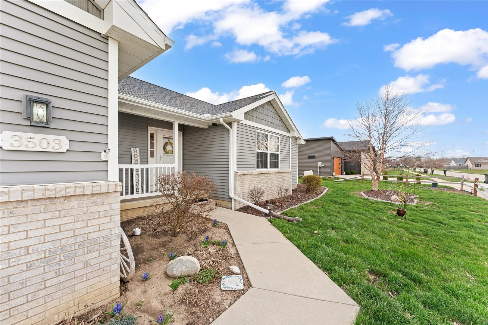 3503 South Deer Ridge Drive Urbana, IL 61802 - Photo 2 of 51 a view of a backyard with table and chairs and a barbeque
