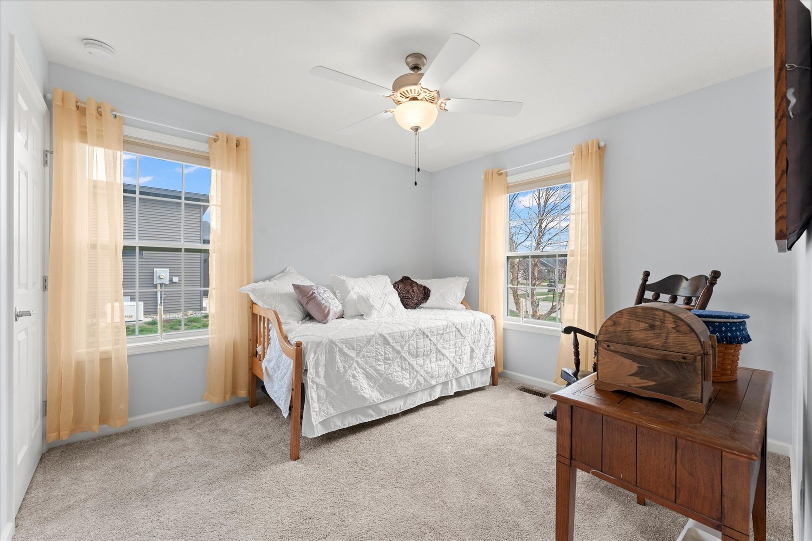 3503 South Deer Ridge Drive Urbana, IL 61802 - Photo 22 of 51 a living room with furniture hardwood floor and a window