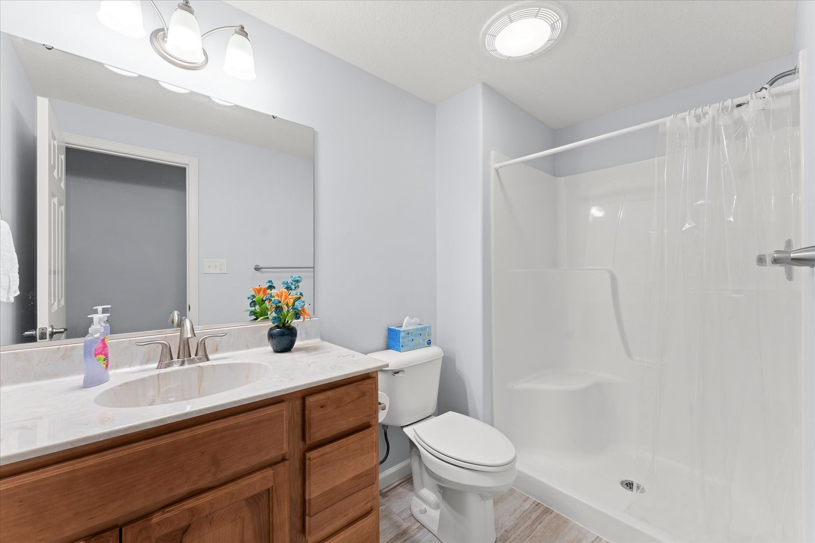 3503 South Deer Ridge Drive Urbana, IL 61802 - Photo 29 of 51 a bathroom with a sink a toilet and shower