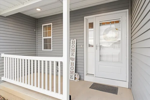 a view of a porch with a door