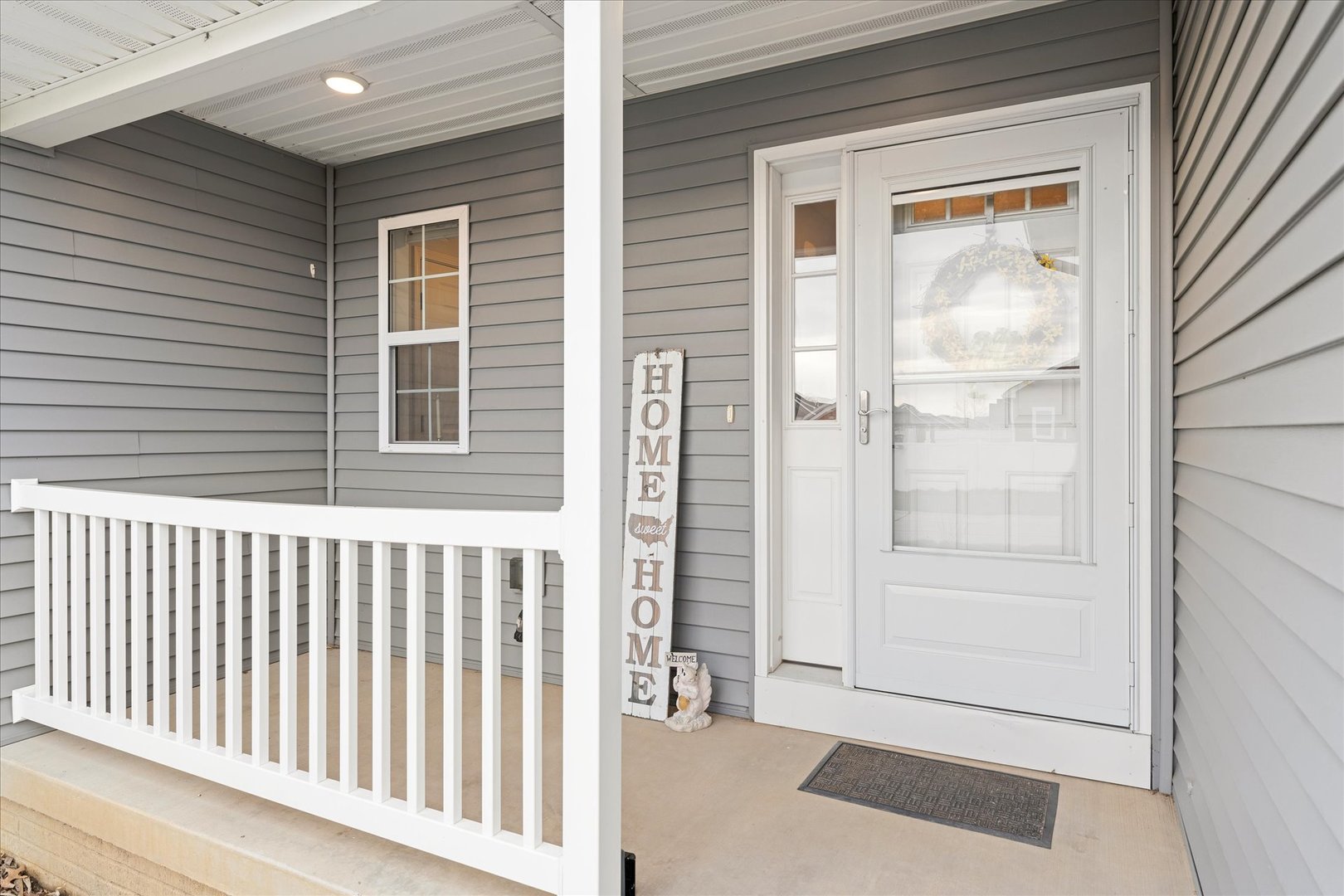 3503 South Deer Ridge Drive Urbana, IL 61802 - Photo 3 of 51 a view of a porch with a door