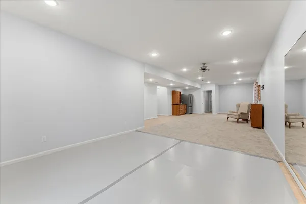 a big room with kitchen view