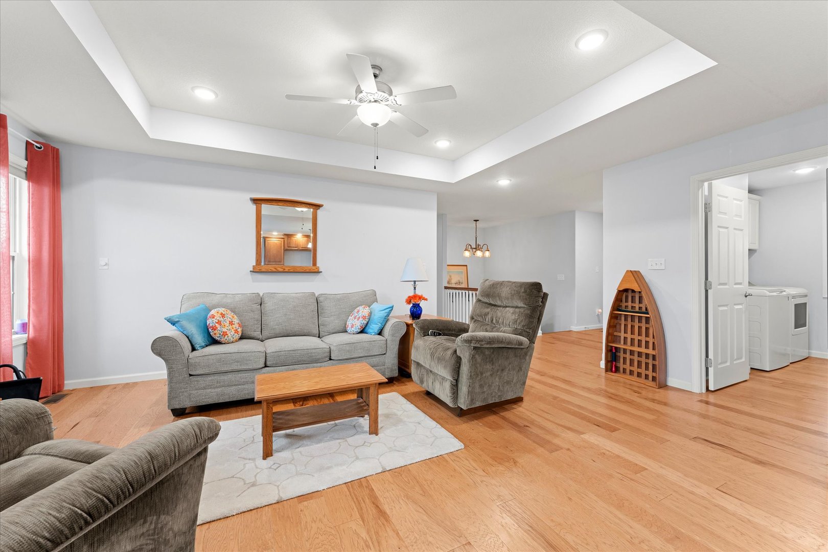3503 South Deer Ridge Drive Urbana, IL 61802 - Photo 8 of 51 a living room with furniture and a chandelier