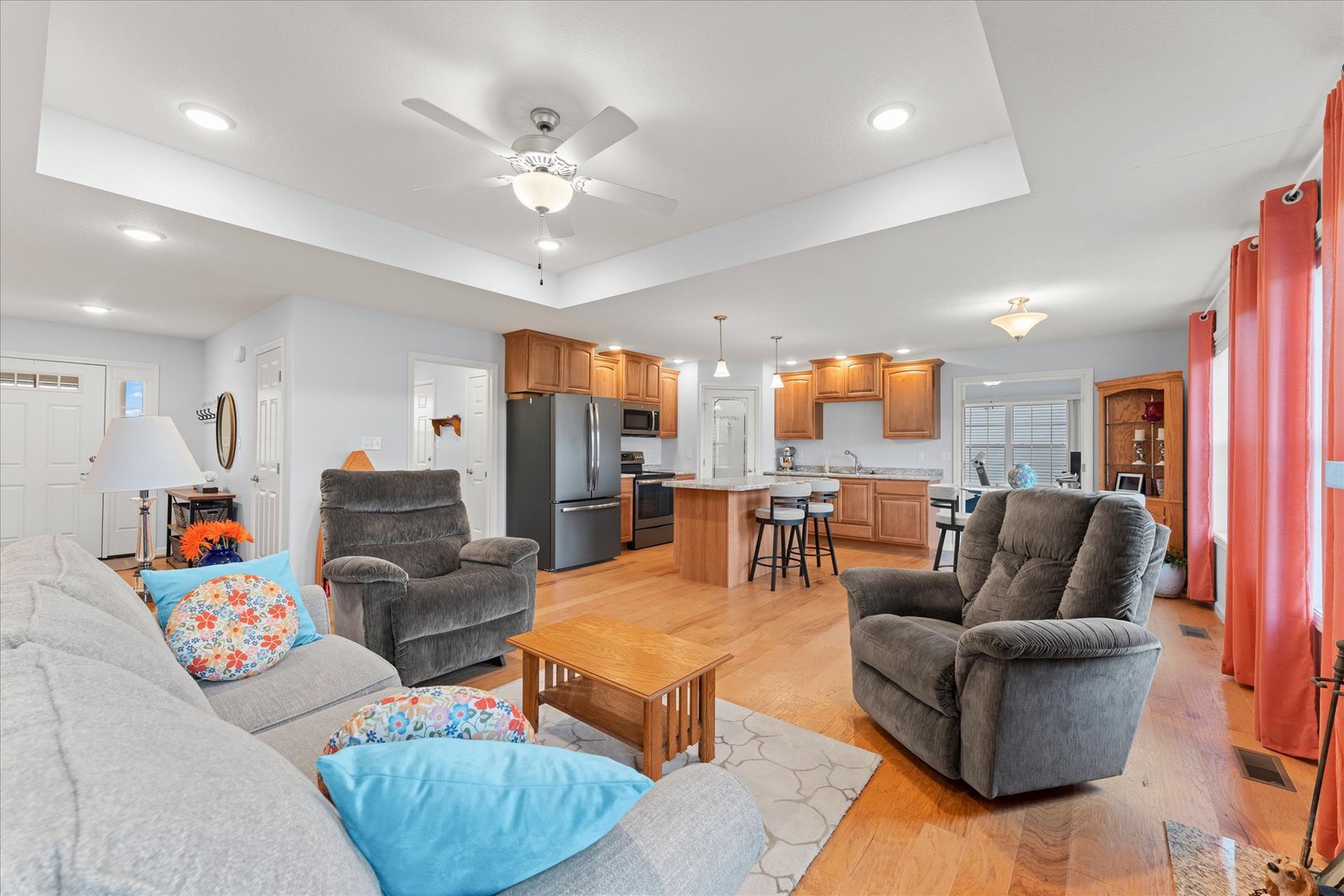 3503 South Deer Ridge Drive Urbana, IL 61802 - Photo 9 of 51 a living room with furniture kitchen view and a chandelier