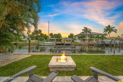 a view of a lake with a garden