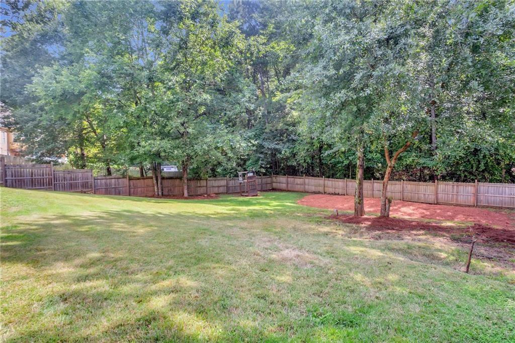 4179 Nance Road Kennesaw, GA 30144 - Photo 18 of 19 a view of a yard with basketball court