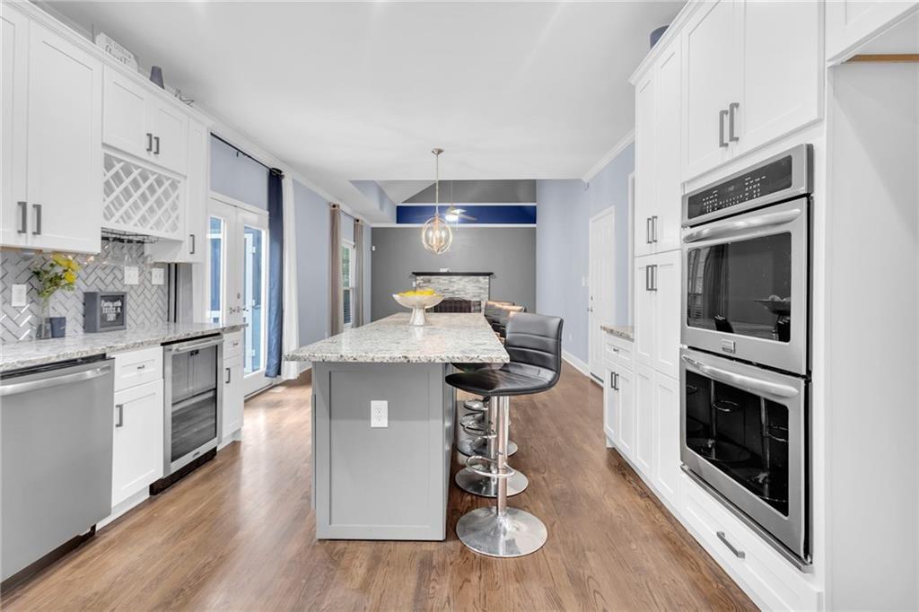 4179 Nance Road Kennesaw, GA 30144 - Photo 2 of 19 a kitchen with stainless steel appliances a stove a sink and a refrigerator