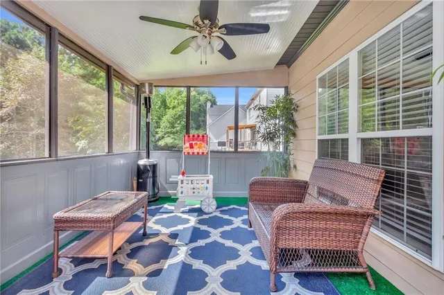 a living room with furniture and a window