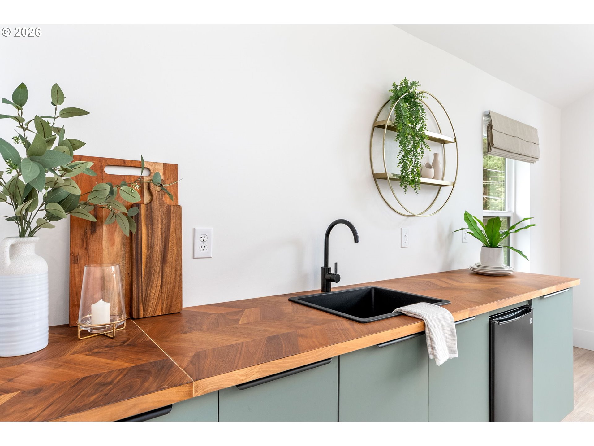 361 Frank Johns Road Stevenson, WA 98648 - Photo 7 of 27 a dining table with potted plants on wooden floor