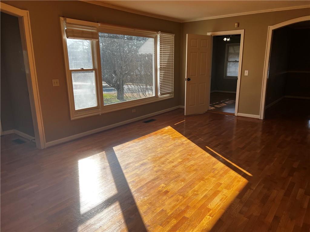 606 Pisgah Way Calhoun, GA 30701 - Photo 4 of 18 a view of a living room with a large window
