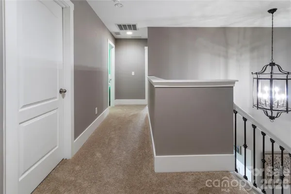 a view of a hallway with entryway