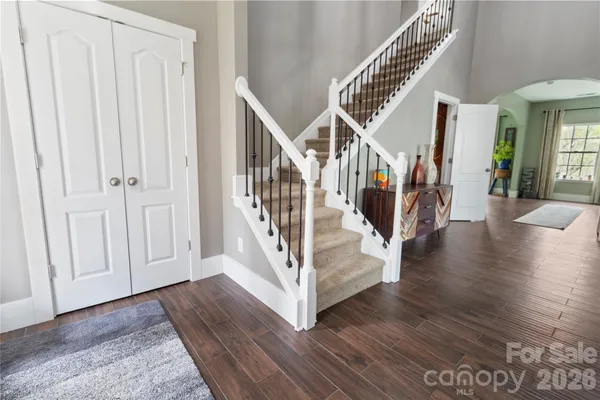 a view of entryway with wooden floor