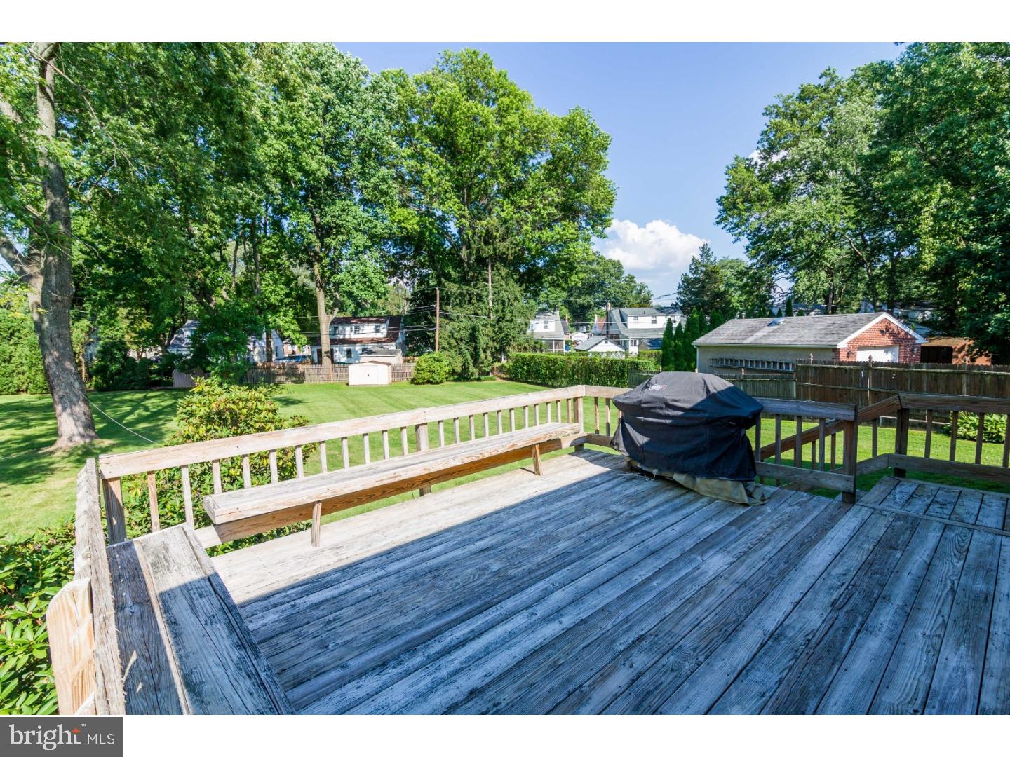 429 Parham Road Springfield, PA 19064 - Photo 22 of 25 a view of an outdoor sitting area with furniture and wooden floor