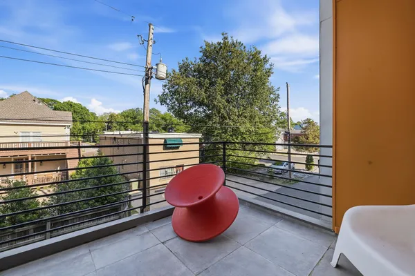 a view of sitting area in front of house