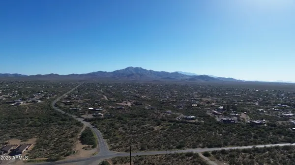 an aerial view of residential house and green space