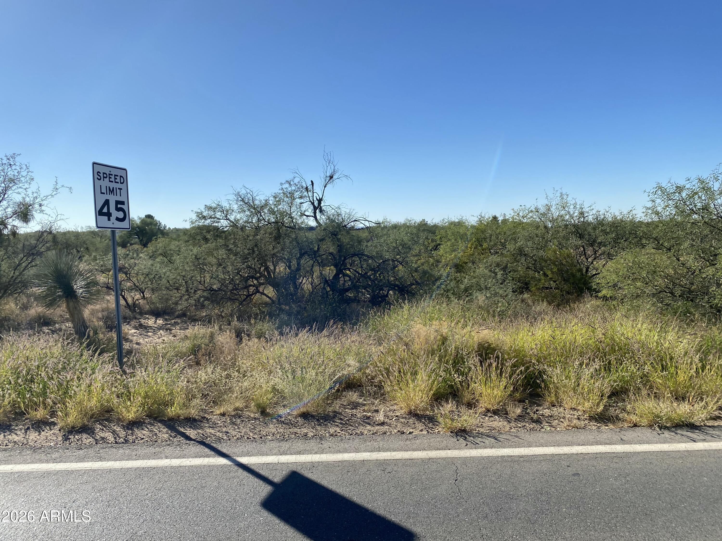 3106 East Andrada Road, Unit 13 Vail, AZ 85641 - Photo 6 of 19 a view of a lake from a yard