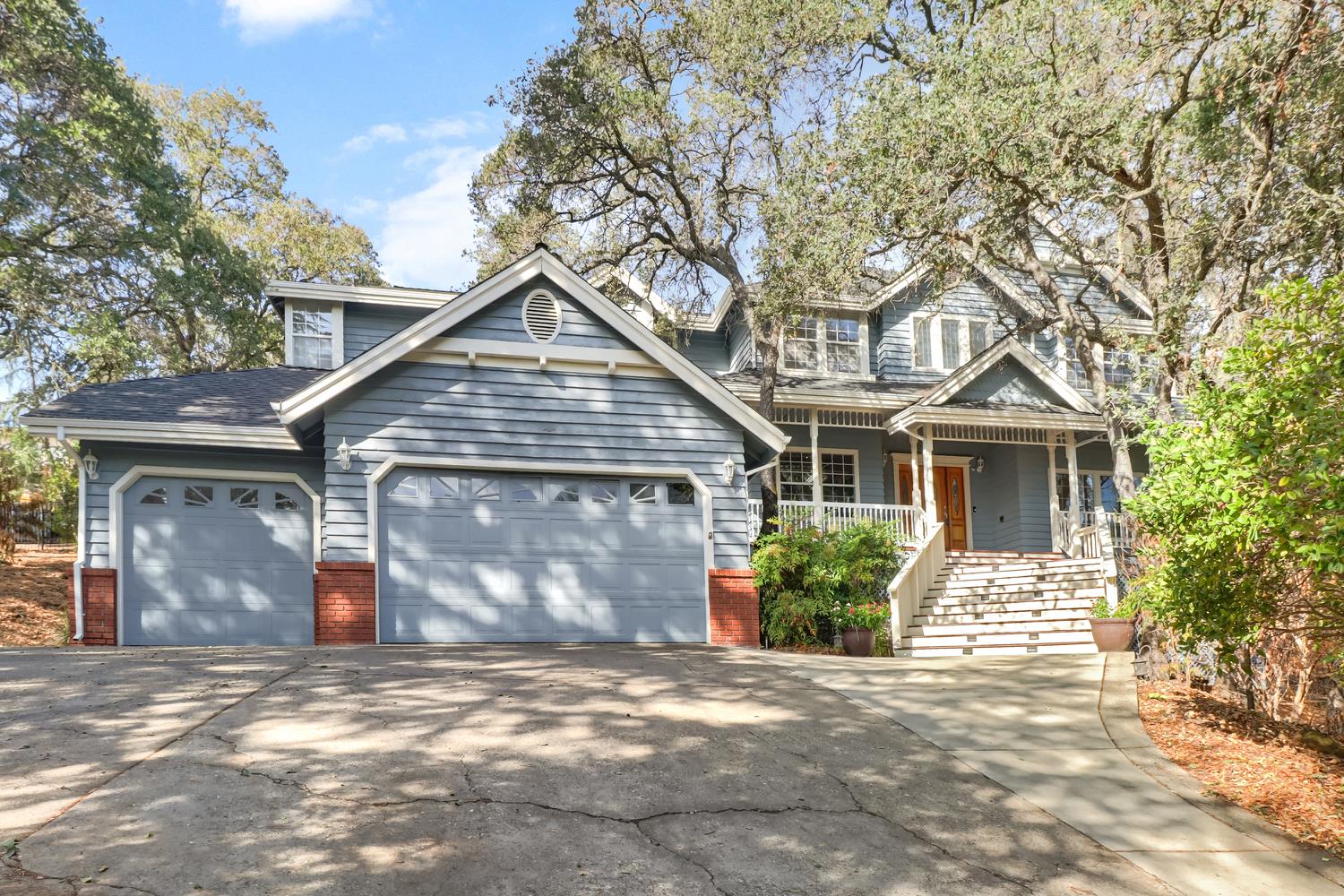 3058 Ridgeview Drive El Dorado Hills, CA 95762 - Photo 1 of 73 a front view of a house with a yard and garage
