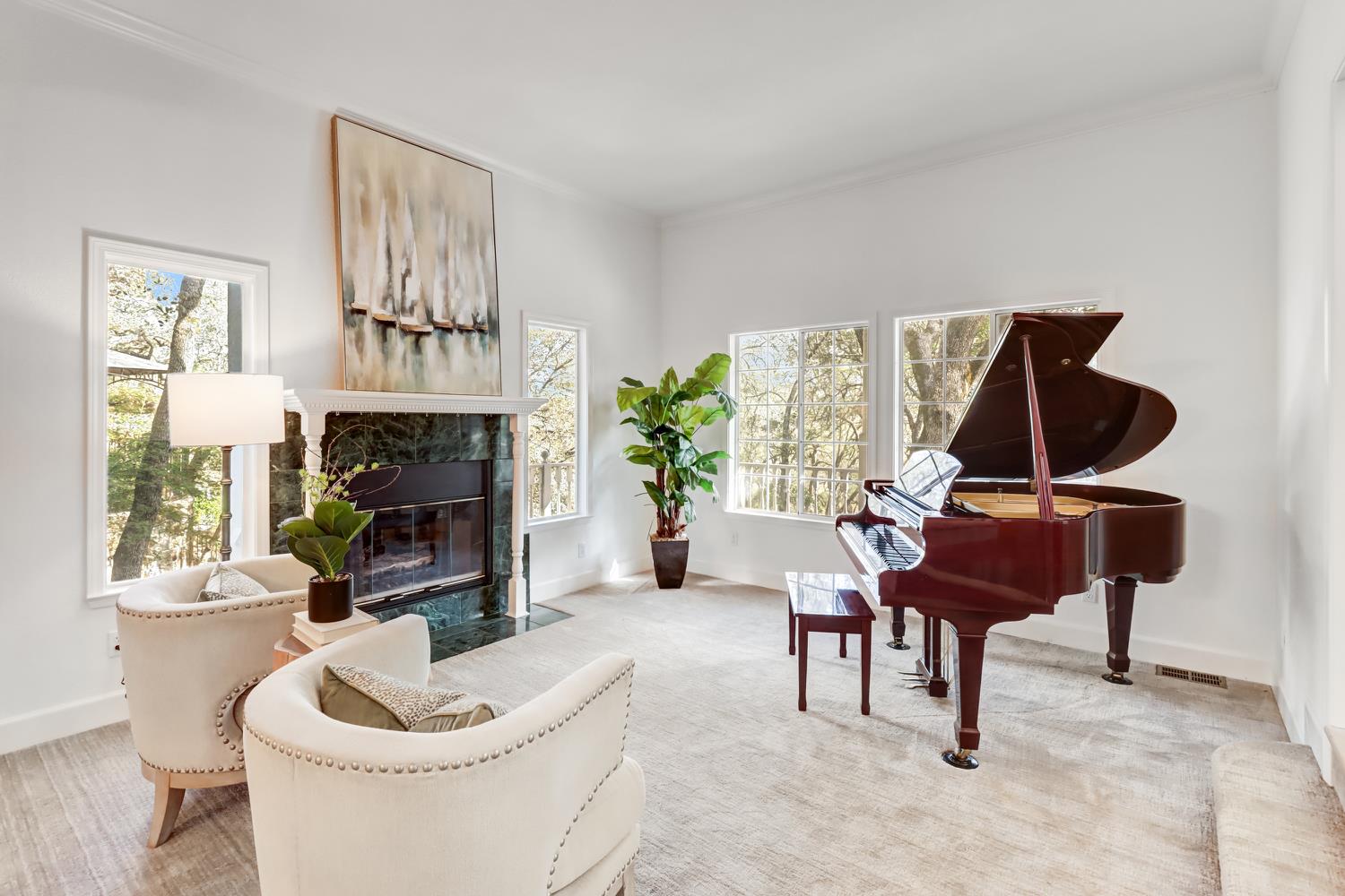 3058 Ridgeview Drive El Dorado Hills, CA 95762 - Photo 12 of 73 a living room with furniture a piano and a fireplace