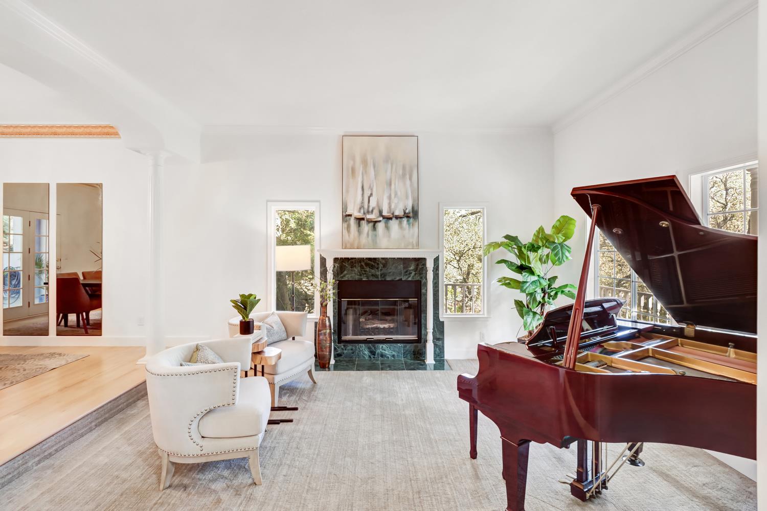 3058 Ridgeview Drive El Dorado Hills, CA 95762 - Photo 13 of 73 a living room with furniture a fireplace and a flat screen tv