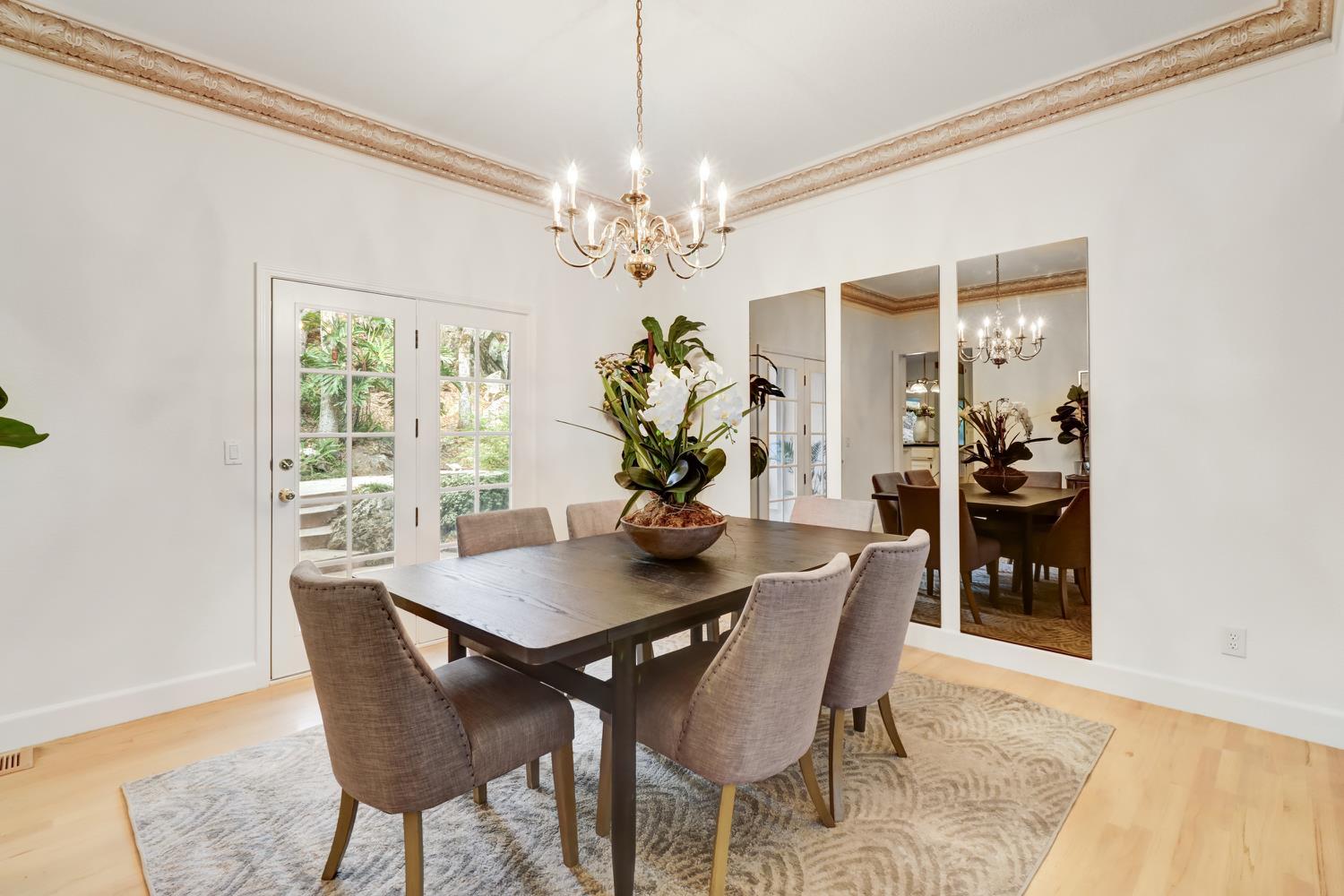 3058 Ridgeview Drive El Dorado Hills, CA 95762 - Photo 15 of 73 a dining room with furniture potted plants and wooden floor