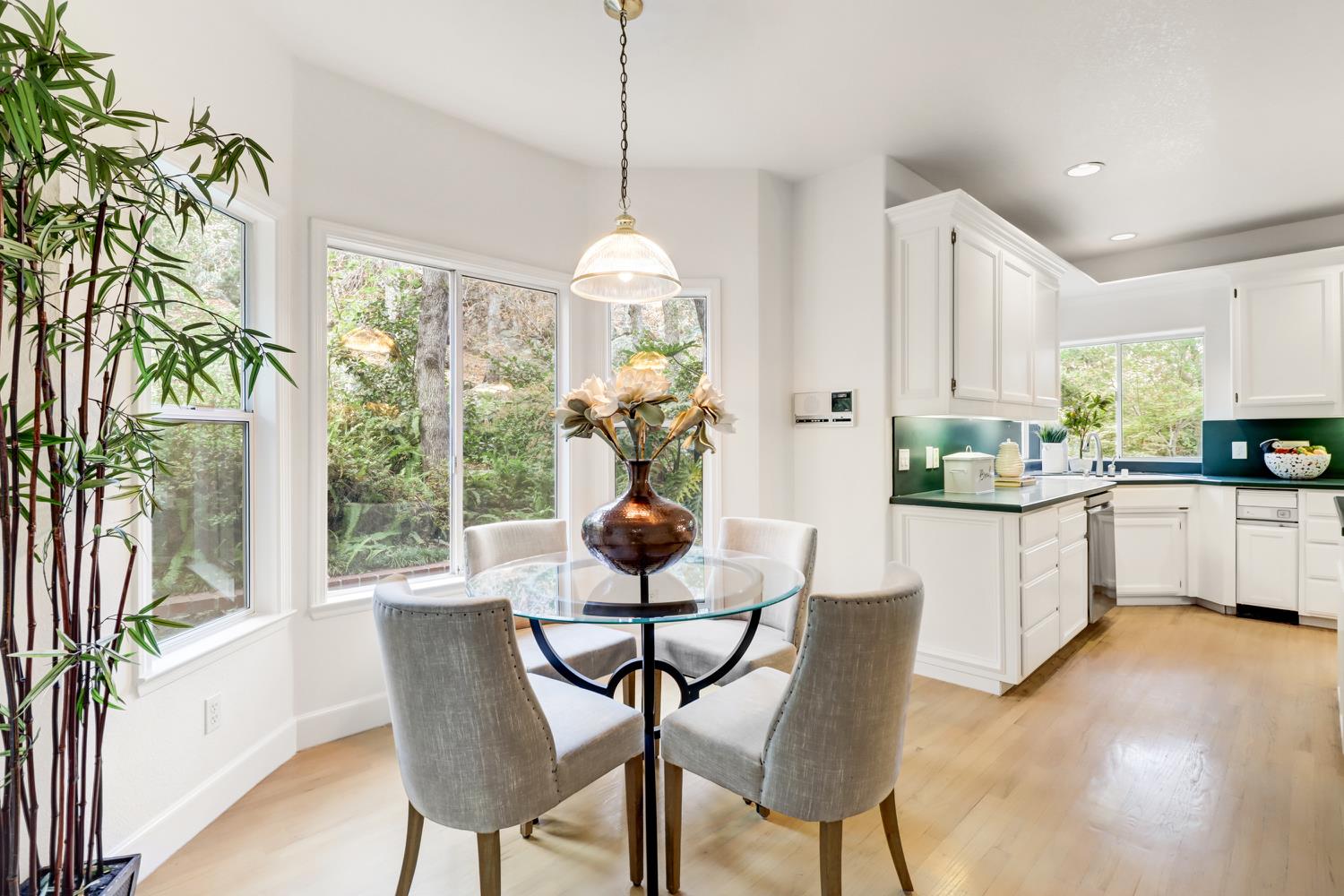 3058 Ridgeview Drive El Dorado Hills, CA 95762 - Photo 21 of 73 a kitchen with stainless steel appliances a dining table chairs and granite counter tops