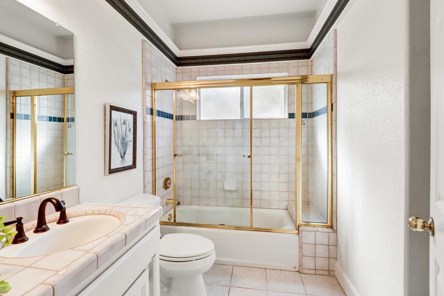 3058 Ridgeview Drive El Dorado Hills, CA 95762 - Photo 32 of 73 a bathroom with a bathtub shower sink vanity mirror and toilet