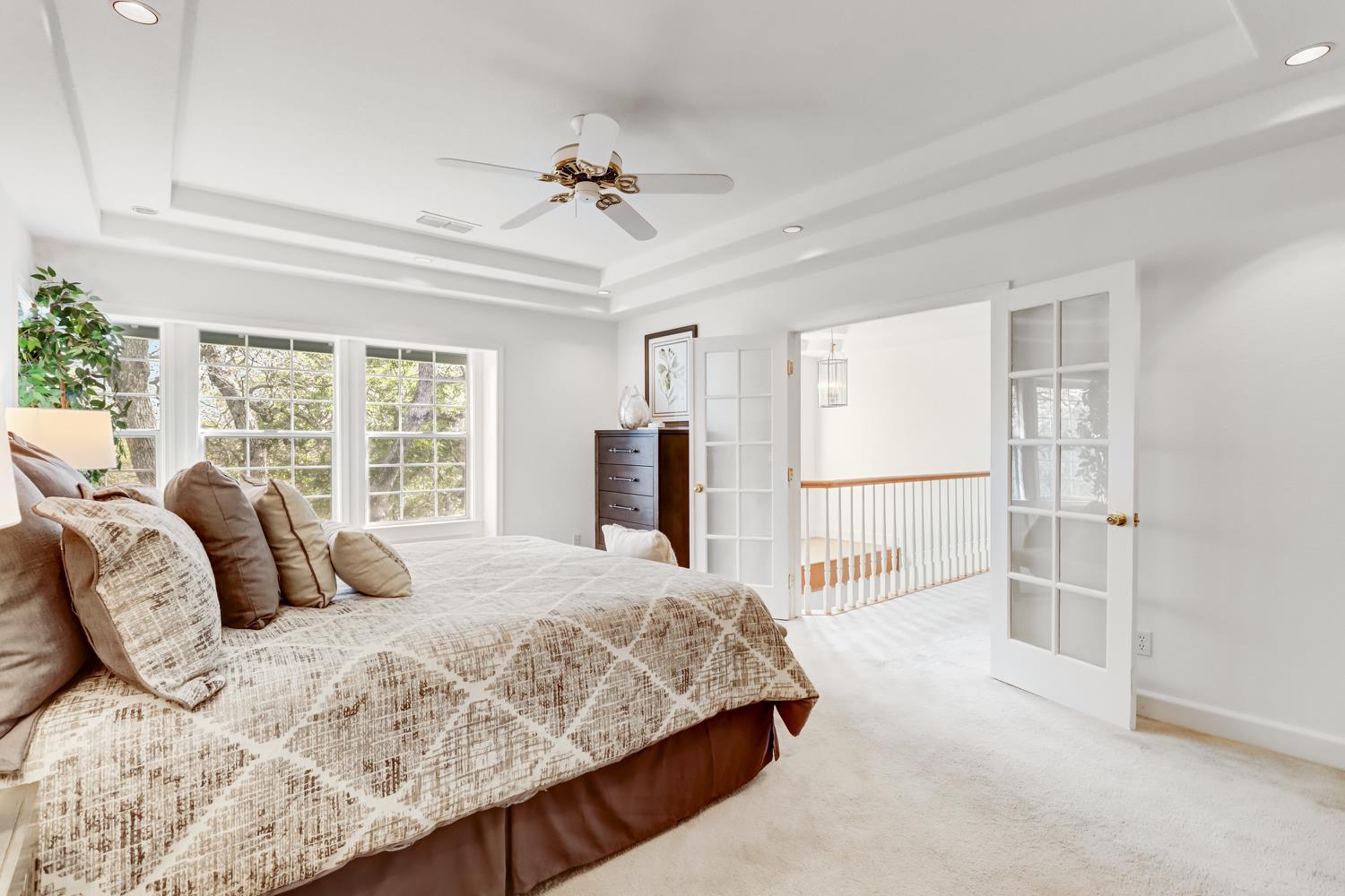 3058 Ridgeview Drive El Dorado Hills, CA 95762 - Photo 41 of 73 a bedroom with a large bed and a window