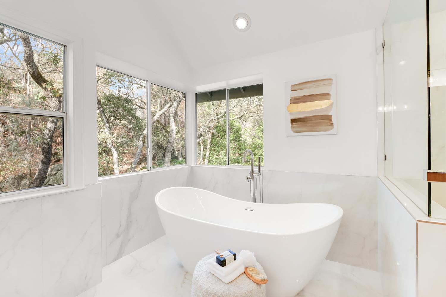 3058 Ridgeview Drive El Dorado Hills, CA 95762 - Photo 49 of 73 a white bath tub sitting in a room next to a window