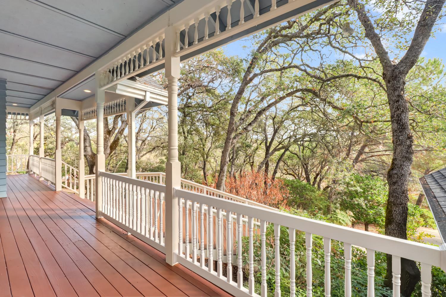 3058 Ridgeview Drive El Dorado Hills, CA 95762 - Photo 8 of 73 a view of a porch with wooden floor and fence