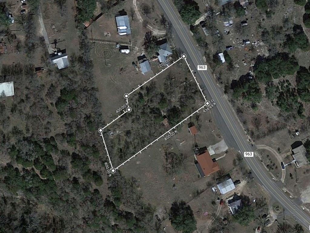 0 Fm 963 Briggs, TX 78608 - Photo 1 of 1 an aerial view of a house with a yard