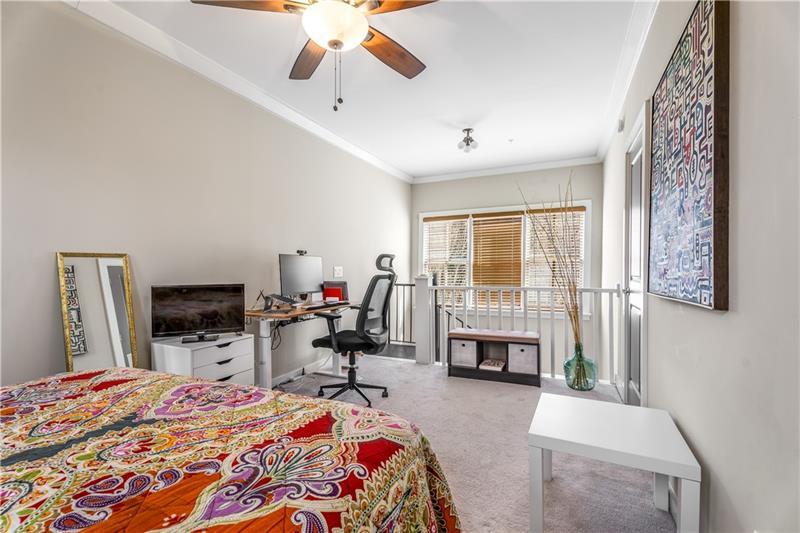 1628 Briarcliff Road Northeast, Unit 18 Atlanta, GA 30306 - Photo 19 of 25 a bedroom with a bed and furniture