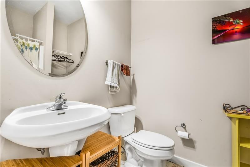 1628 Briarcliff Road Northeast, Unit 18 Atlanta, GA 30306 - Photo 21 of 25 a bathroom with a sink and a mirror