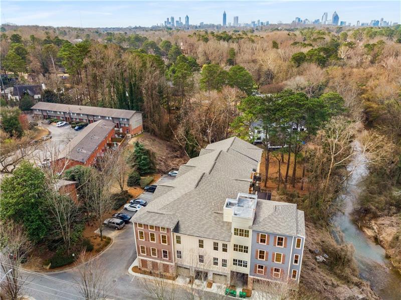 1628 Briarcliff Road Northeast, Unit 18 Atlanta, GA 30306 - Photo 24 of 25 an aerial view of a house with a yard