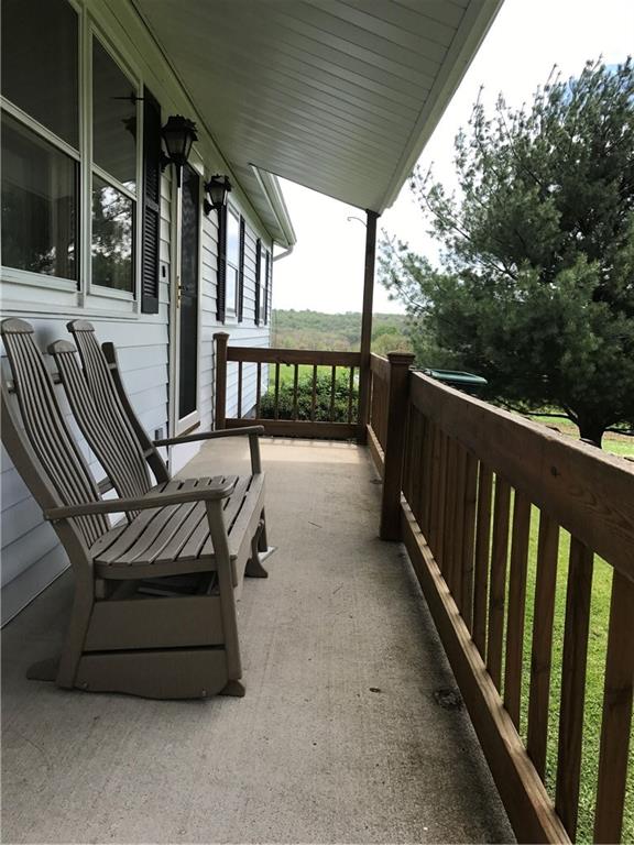 134 Glen Rape Road Rochester, PA 15074 - Photo 22 of 25 Covered front porch to watch the beautiful sunsets.