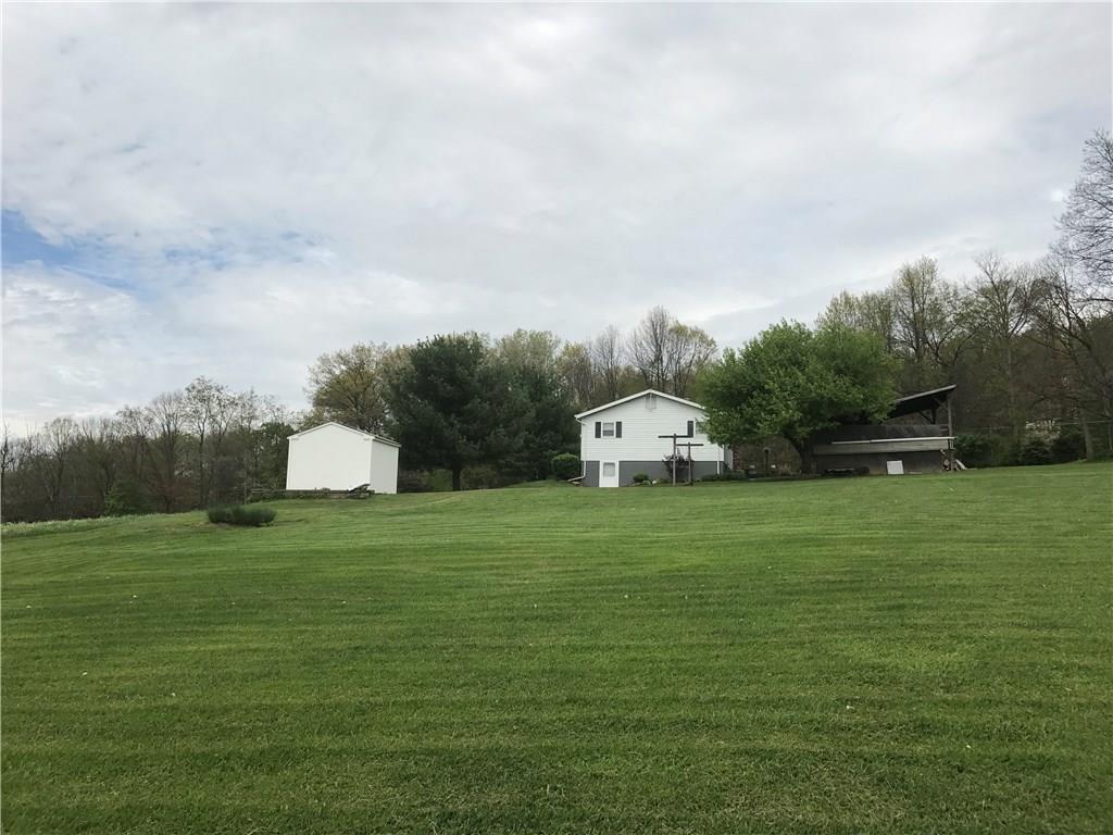 134 Glen Rape Road Rochester, PA 15074 - Photo 6 of 25 Side view of the house, Storage shed, and Multipurpose shed