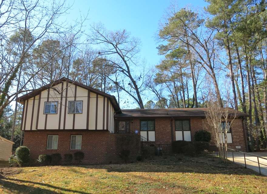 5809 Old Forge Circle Raleigh, NC 27609 - Photo 1 of 25 Updated 5BR/3BA/2908sf split level home on .30 acre wooded lot in North Raleigh's Falls Church near shops/restaurants/schools/parks! Exterior Front