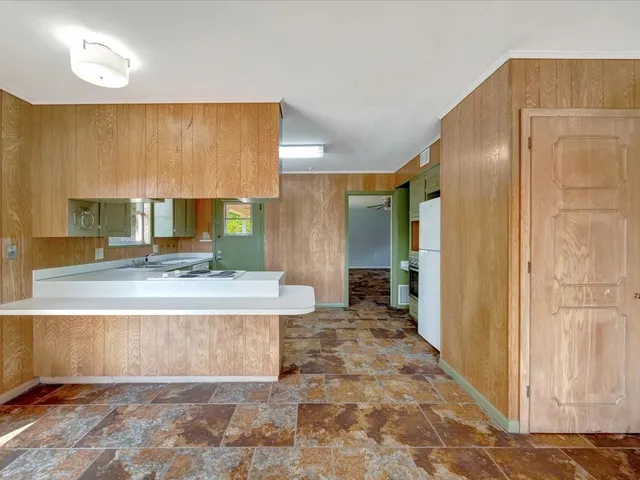 a large bathroom with a large mirror