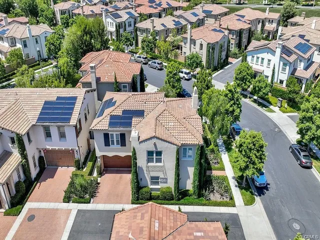 an aerial view of house with yard