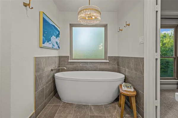 a bathroom with a toilet and a sink