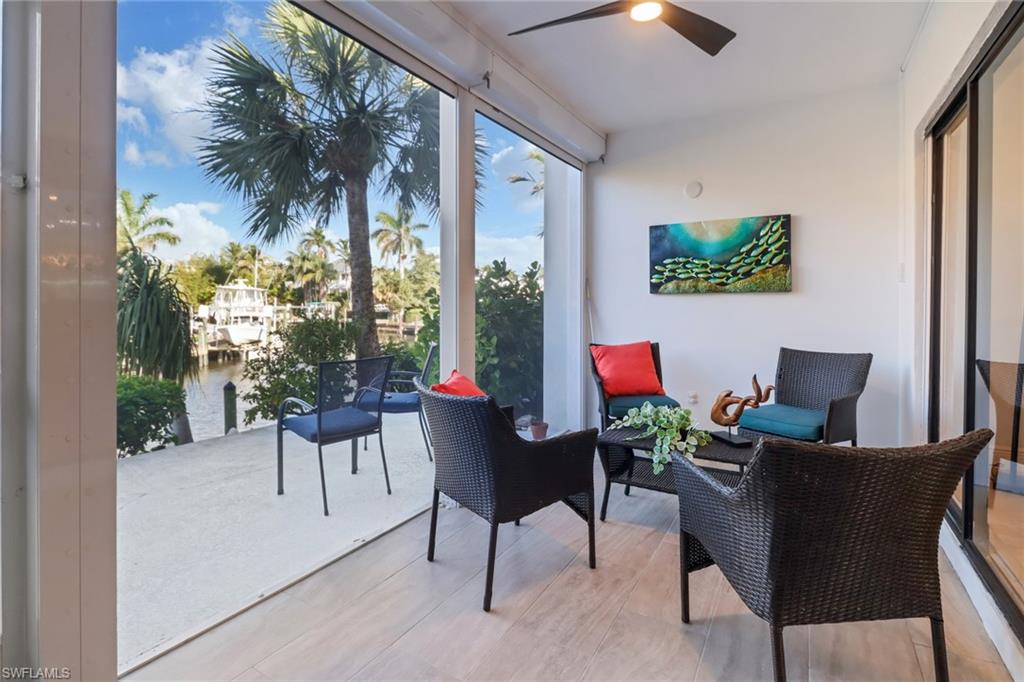 1200 Cherrystone Court, Unit A104 Naples, FL 34102 - Photo 20 of 29 View of sunroom / solarium