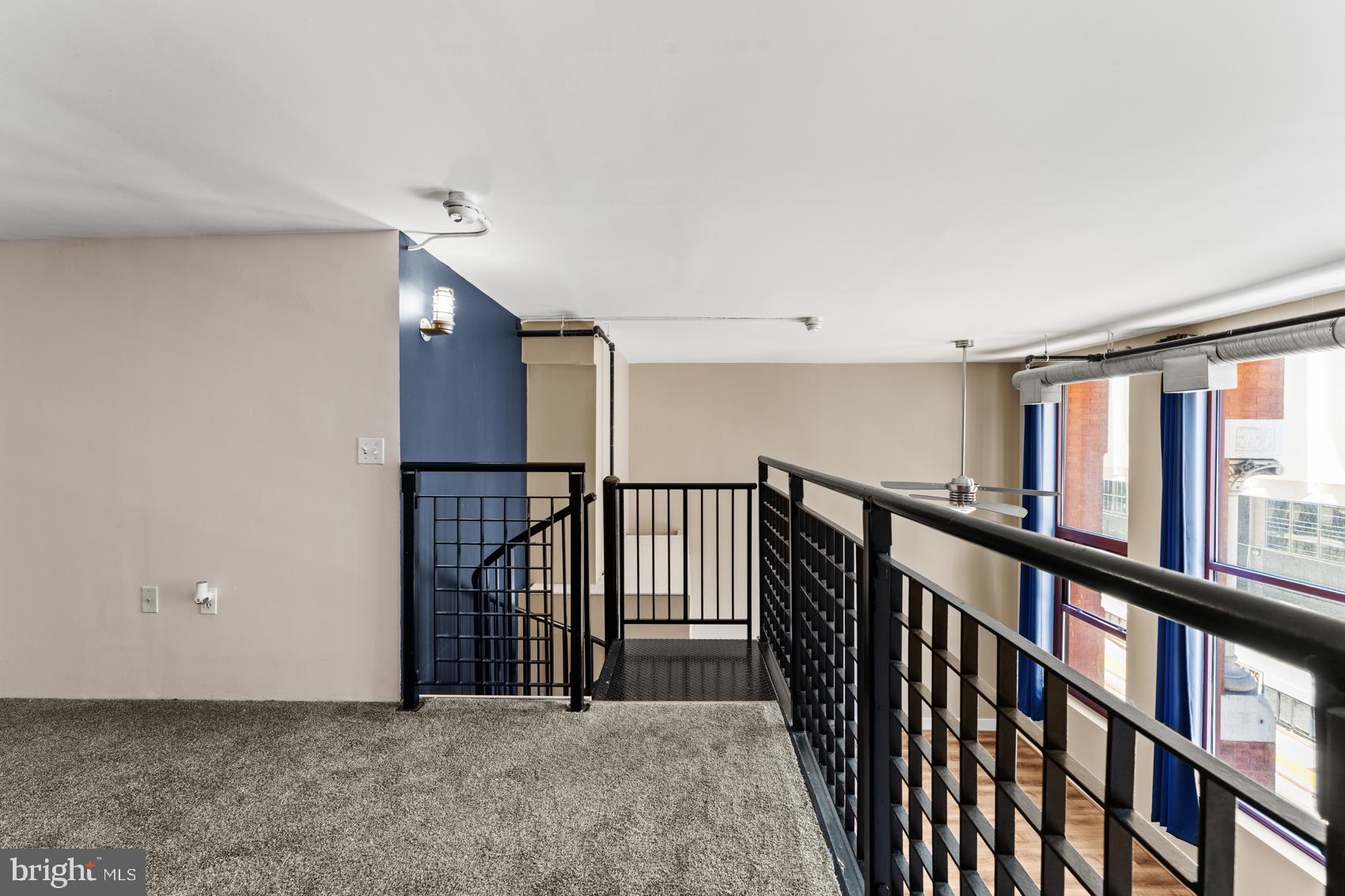 22 South Howard Street, Unit R201 Baltimore, MD 21201 - Photo 24 of 34 a view of hallway with stairs
