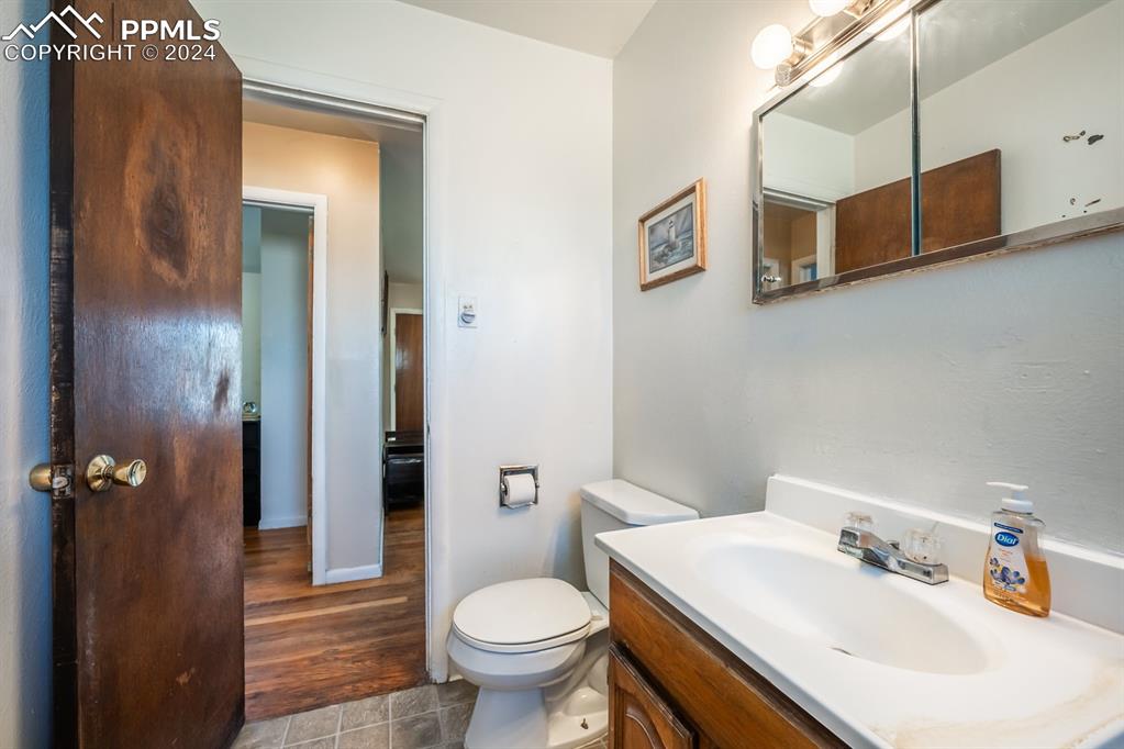 91 Duke Street Pueblo, CO 81005 - Photo 12 of 30 a bathroom with a sink toilet and shower