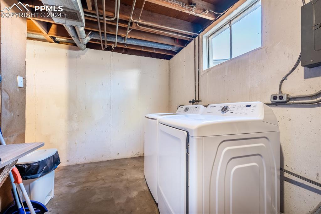 91 Duke Street Pueblo, CO 81005 - Photo 24 of 30 a utility room with dryer and washer