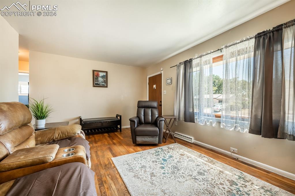 91 Duke Street Pueblo, CO 81005 - Photo 5 of 30 a living room with furniture and a large window