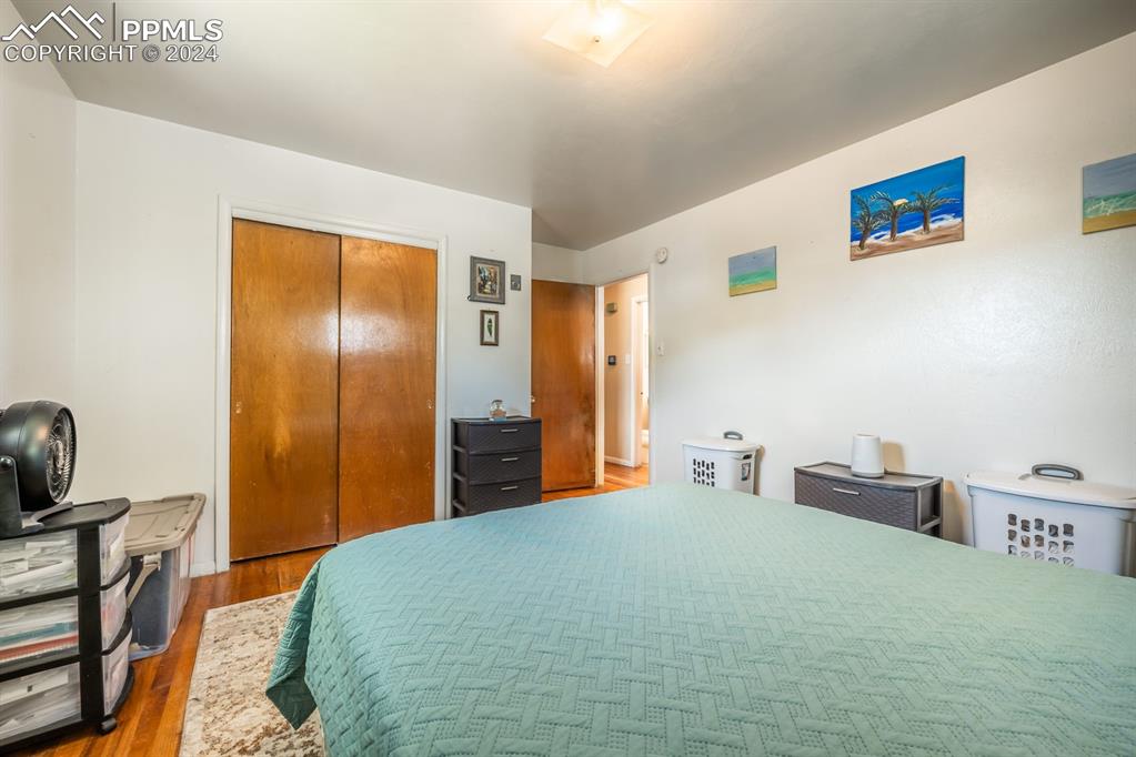 91 Duke Street Pueblo, CO 81005 - Photo 10 of 30 a bedroom with a bed and a desk