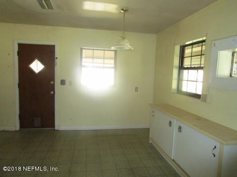 7207 Ridgeway Road North Jacksonville, FL 32244 - Photo 5 of 12 a view of an empty room with a window