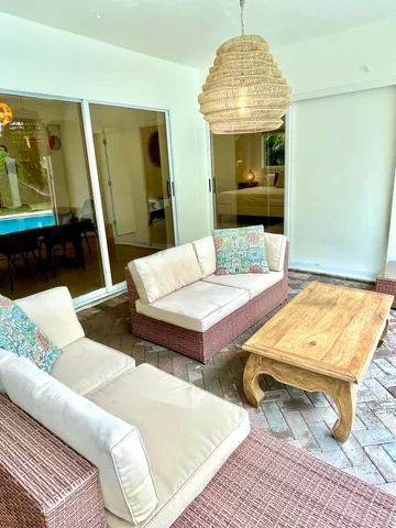 a living room with a couch and a table