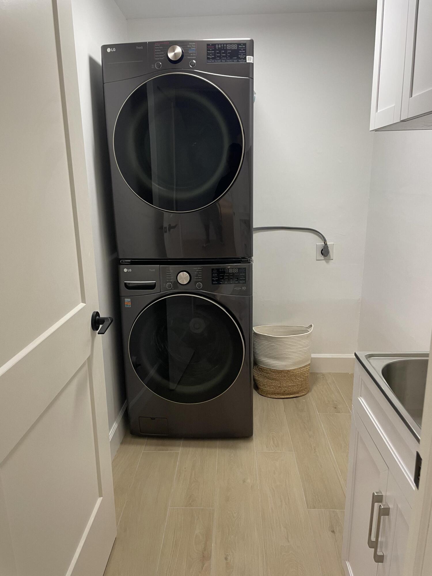 921 Northwest 7th Street Boca Raton, FL 33486 - Photo 16 of 18 a utility room with a washer and dryer