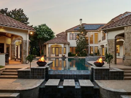 a front view of house with outdoor seating